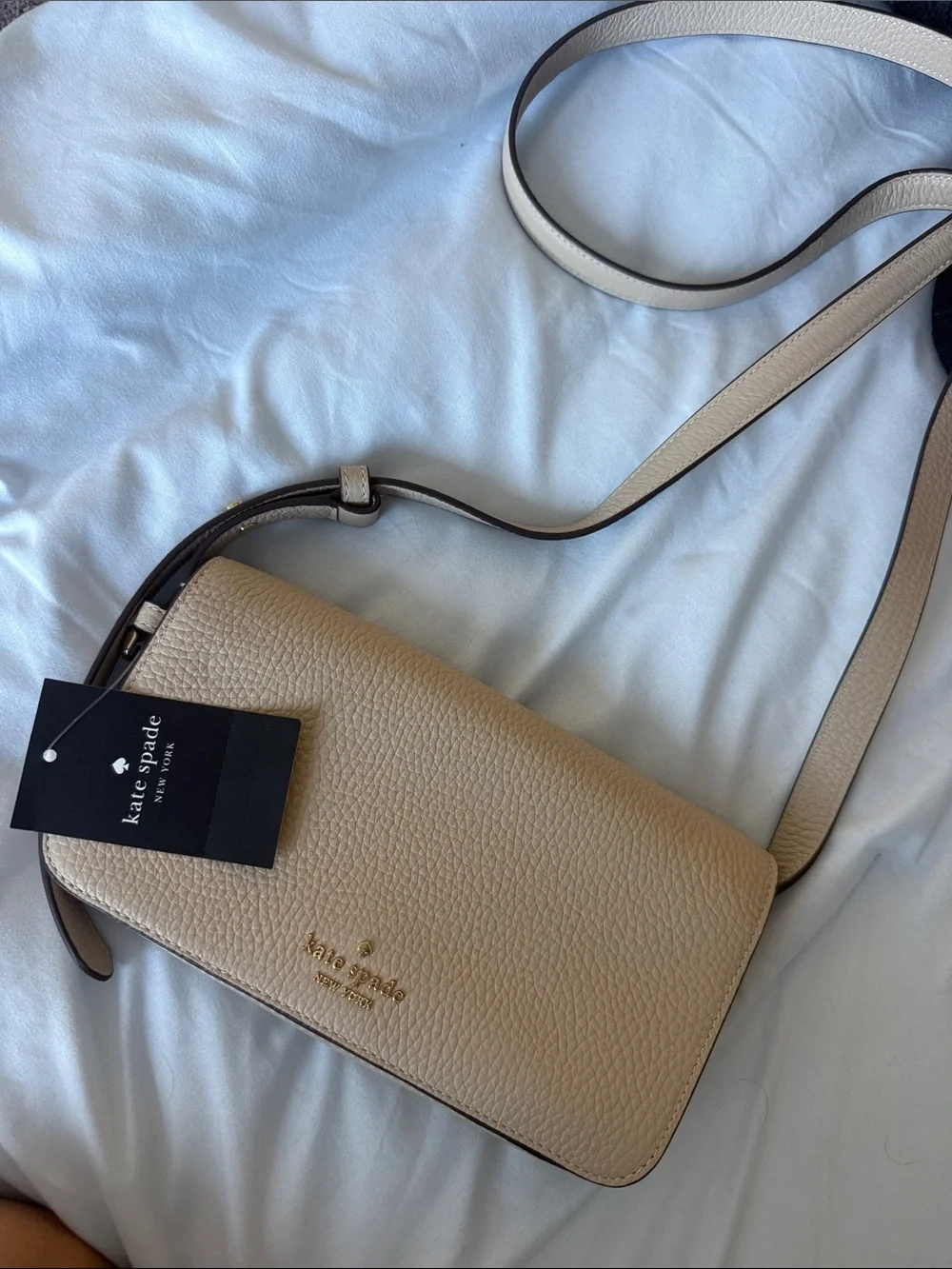 kate spade Pebbled Leather Crossbody in Beige